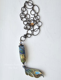 Butterfly wing pendant in shades of aqua and yellow