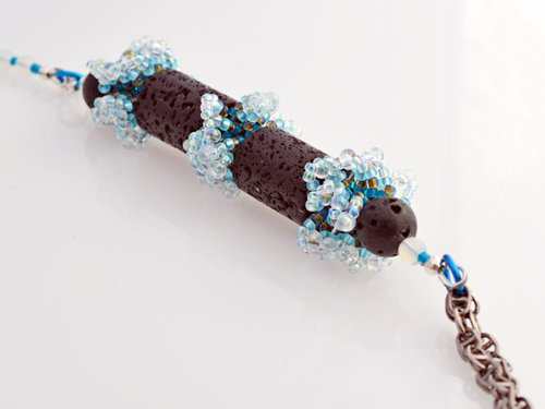 Artisan Bead created from beaded beads and lava stonehttp://honeyfromthebee.indi
