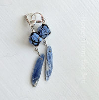 Blue kyanite earrings feature lampwork in lavender and purple