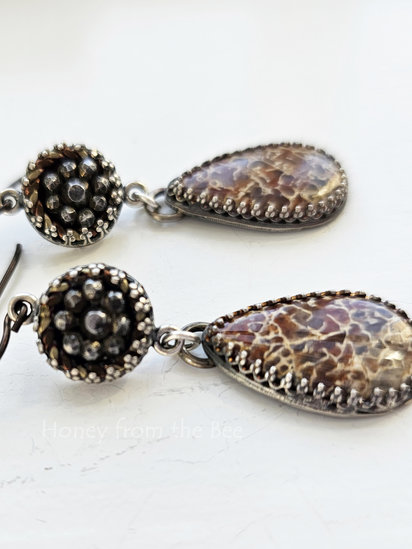 Everything Old earrings features fossilized dinosaur bone, sterling silver and antique buttons