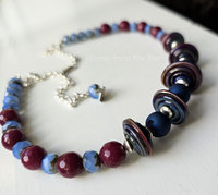 Lampwork necklace in blue and dark rose and sterling silver