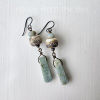 Aqua and Cream earrings feature lampwork, aquamarine dangles, and jasper
