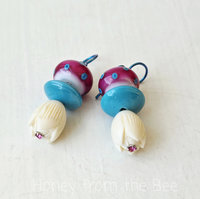 Colorful earrings in turquoise and pink