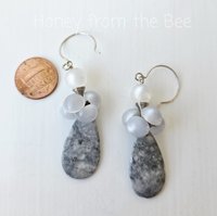 Grey and white earrings feature vintage buttons and jasper