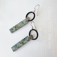 Bold turquoise earrings with sterling silver leaf accent