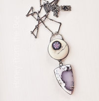 Statement necklace in sterling silver with dendritic opal and art glass cab with flower motif