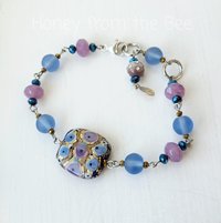 Artisan bracelet in pink and blue
