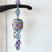 Beaded bracelet in blue and pink