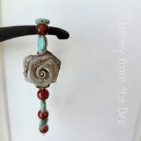 Sterling silver rose bracelet with turquoise and carnelian