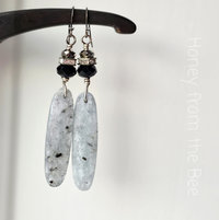 Evening artisan earrings in pale blue and black