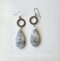 Grey and white earrings feature marcasite and orbicular jasper