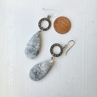 Teardrop earrings feature orbicular jasper and marcasite