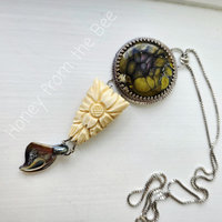One of a kind artisan pendant in floral theme