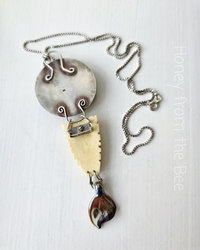 Sterling silver pendant in garden theme