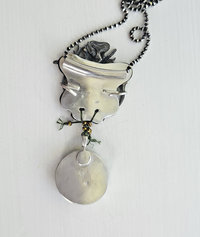 Back of sterling silver artisan pendant