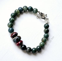Dark teal and green moss agate bracelet with red lampwork