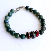 Moss Agate bracelet with lampwork and red and green and dark teal