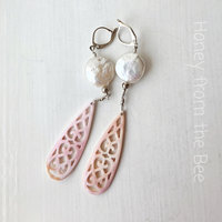 Pink and white earrings feature coin pearls