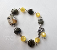 Yellow and grey beaded bracelet