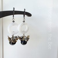 Vintage brass and antique button earrings with mother of pearl