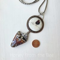 Stunning art pendant in red and white with sterling silver and copper