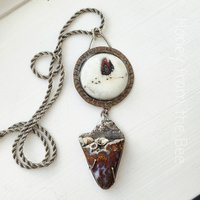 Art pendant featuring plume agate and lampwork cabochon set in sterling silver and copper