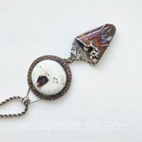 Plume Agate pendant with art glass cabochon 