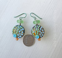 Ocean inspired earrings in orange, teal and green