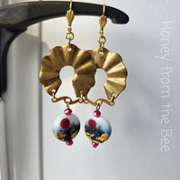 Gold ribbon earrings with red, white and black lampwork