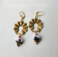 Brass and glass earrings in artisan style