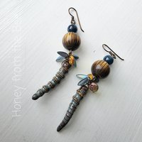 Artisan earrings in blue and brown