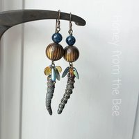 Long dangle earrings in brown and blue