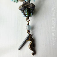 Seahorse charm dangles from this summer necklace