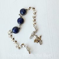 Sterling silver chain bracelet with faceted lapis lazuli