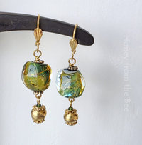 Green and gold earrings feature lampwork and vermeil