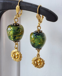 Green and gold earrings with bird's nest dangle