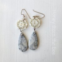 Grey and white earrings feature orbicular jasper