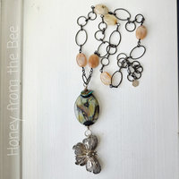 Turquoise and silver necklace with butterfly theme