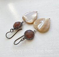Mauve and cream earrings feature peach moonstone and mother of pearl