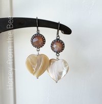 Rose earrings with cream hearts feature peach moonstone