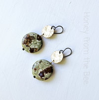Green and brown stone earrings with textured brass
