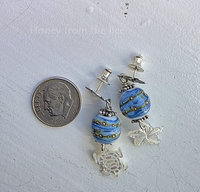 Silver and blue earrings with mother of pearl dangles