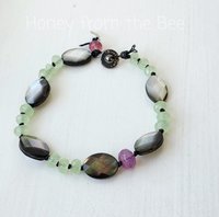 Green and pink bracelet with grey shell beads