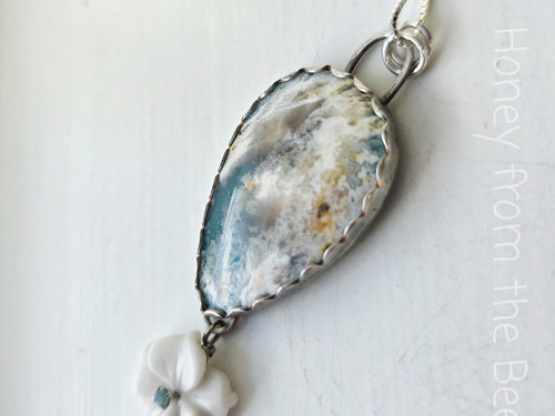 Plume Agate pendant with white flower dangle