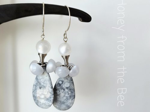Grey and white earrings feature vintage buttons and orbicular jasper