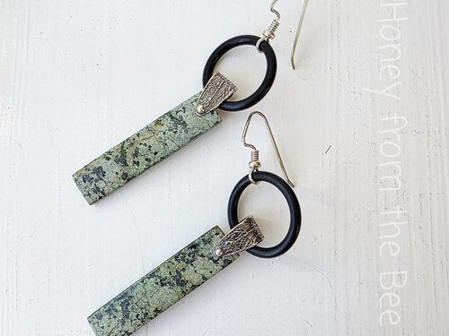 Bold turquoise earrings with sterling silver leaf accent