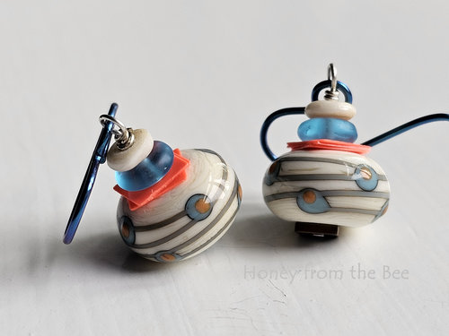 Polka dot lampwork earrings in cream, aqua and fluorescent orange