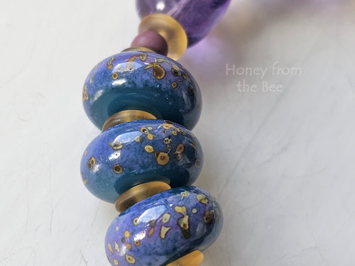 Stunning lampwork beads in this artisan bracelet