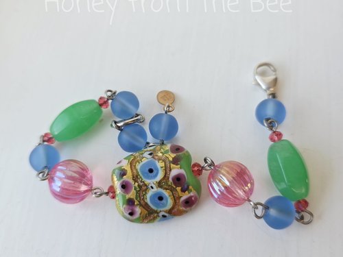 Artisan bead bracelet in blue, pink and green