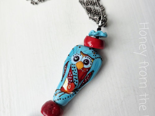 Lampwork necklace features owl in red and turquoise